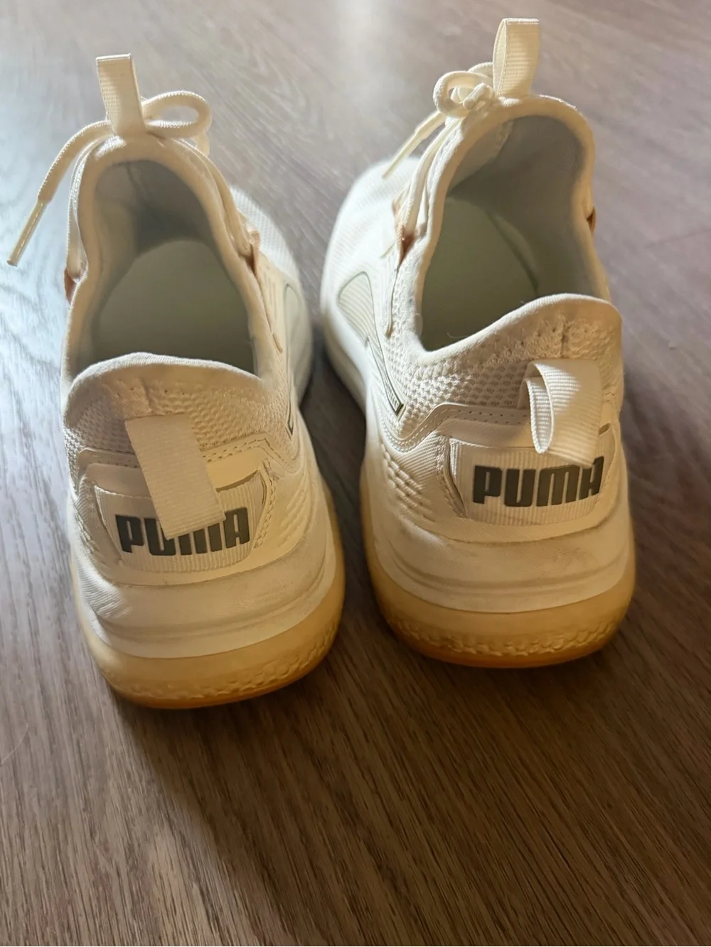 Puma women’s Off-White Cream Athletic Sneakers